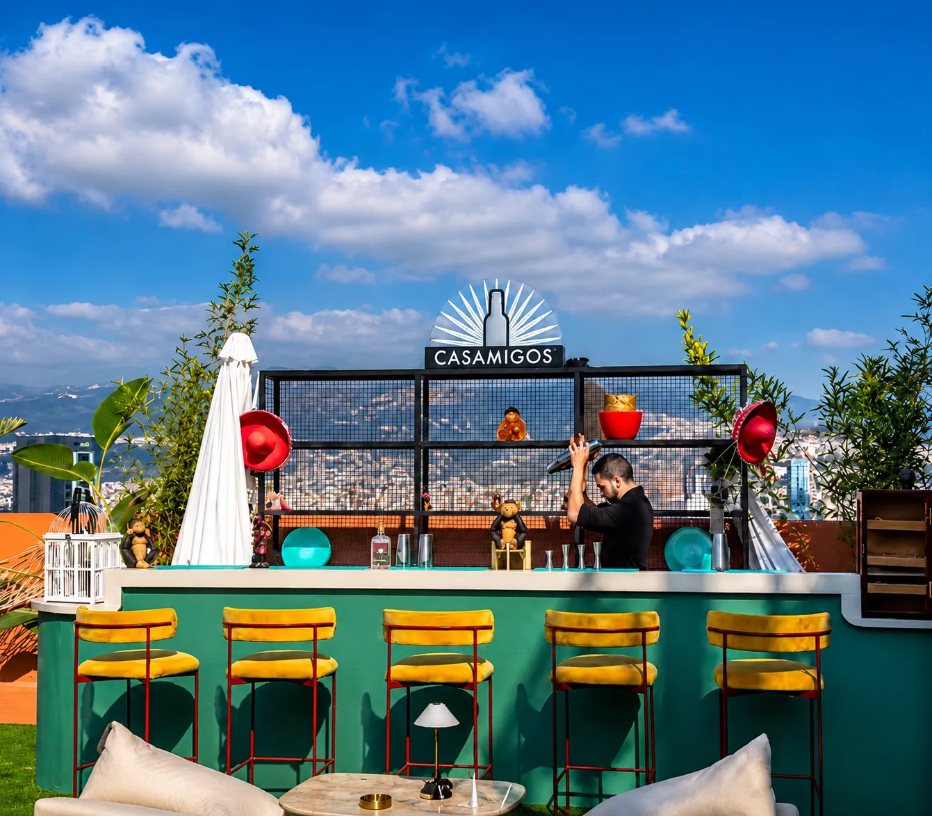 Guests enjoying Le Tanning Rooftop at sunset